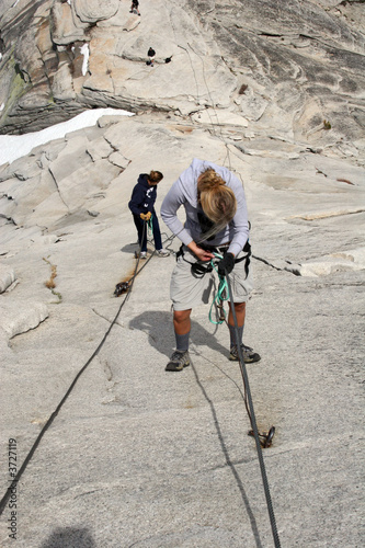 Females climbing Half Dome before the cables are up.