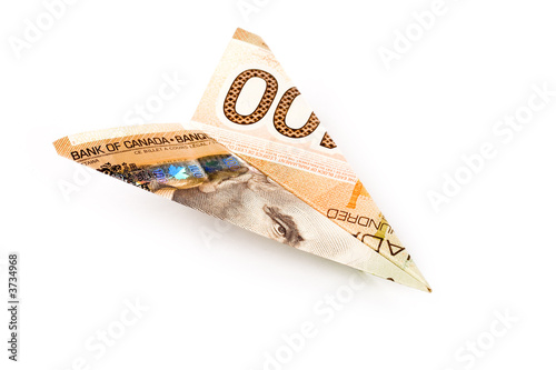 Photos canadian dollar paper airplane, business concept