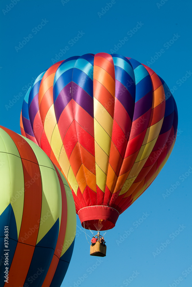 Obraz premium Ascending Hot Air Balloons in a crystal clear blue vermont sky