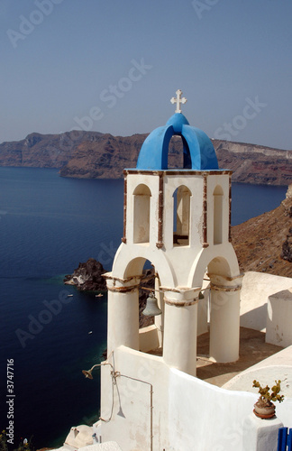 santorini greek church bell tower over sea oia caldera cliffs