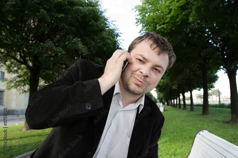 Man with telephone outdoor in the sammer Man with telephone outdoor in the sammer