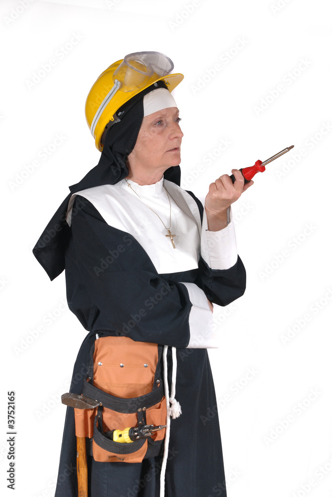 Middle aged DIY sister, nun with tool belt.  Religion,  