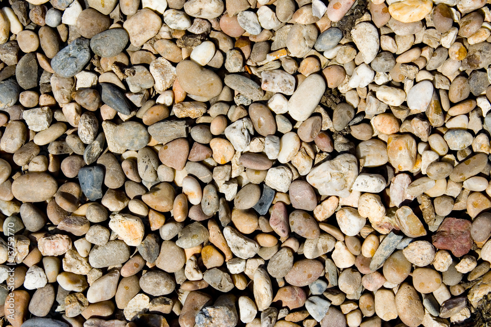 Natural stones texture from a rocky river side, beach Natural stones texture from a rocky river side, beach