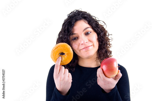 girl weighs her options - donut or an apple