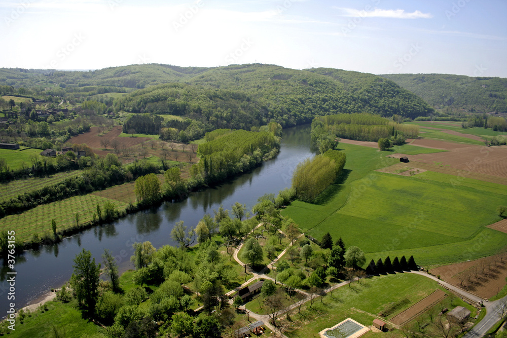 wide landscape view of fields and river, france