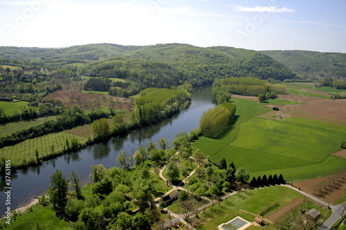 wide landscape view of fields and river, france