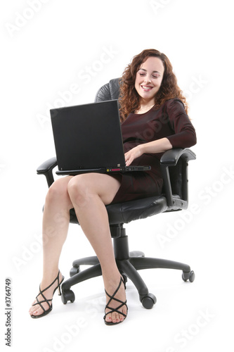 A pretty business woman using her laptop computer