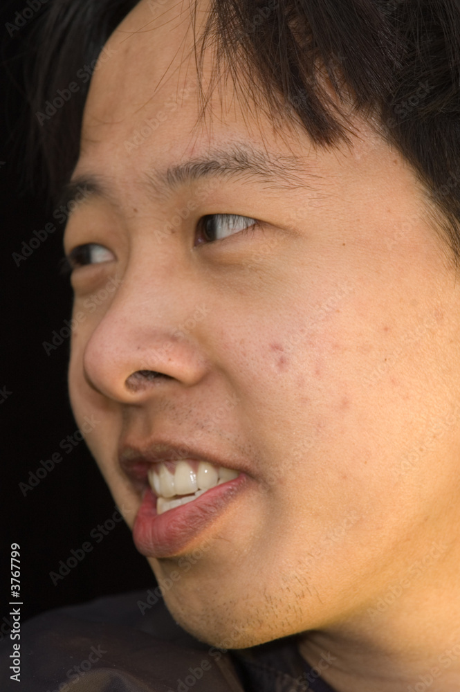 Obraz premium young asian man smiling