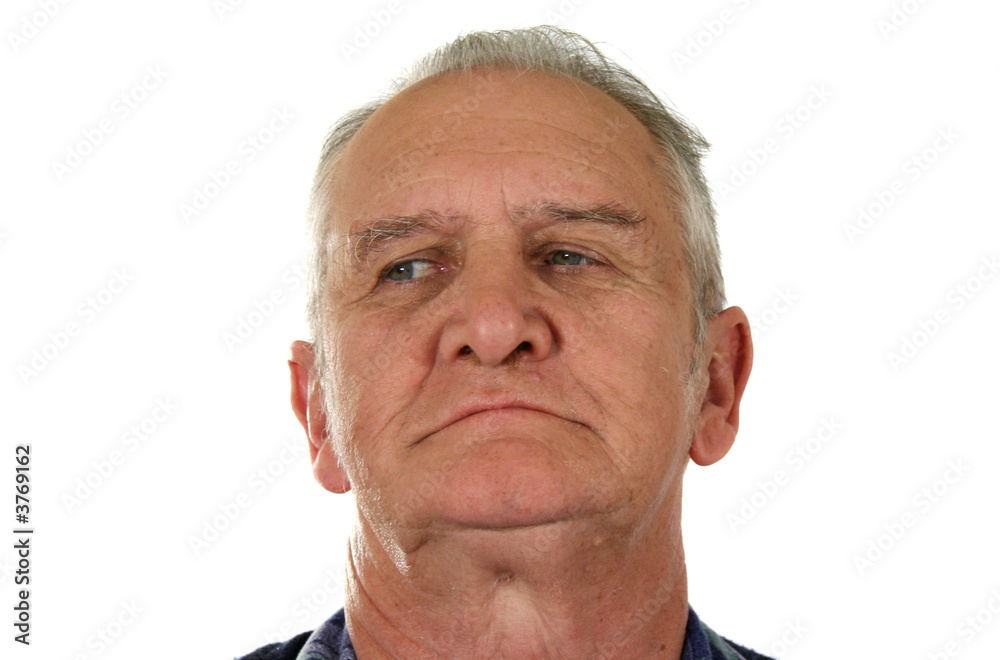 Suspicious senior man looking to the right. Suspicious senior man looking to the right.