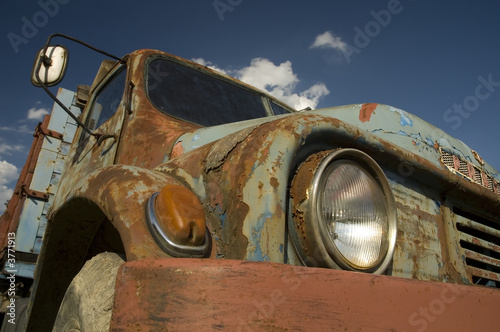 Blue old-fashioned rusty ancient car Praga V3S. photo