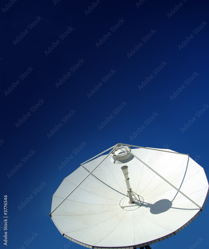 Satellite dish on blue sky