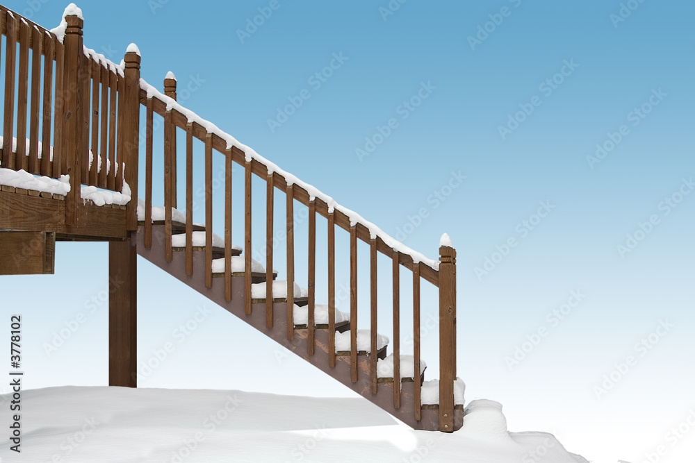 Obraz premium a snow covered deck and stairway