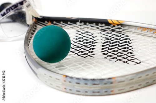 Close up shot of racquetball gear on a white background. photo