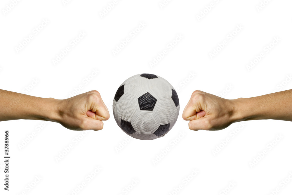Two hands trying to smashing a soccer ball Two hands trying to smashing a soccer ball