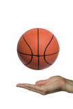 A hand showing a basketball