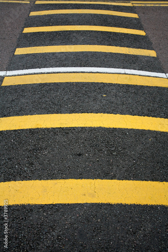 rural road in the country side pedestrian yellow marks