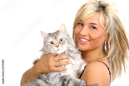 woman holding, hugging, kissing her cat photo