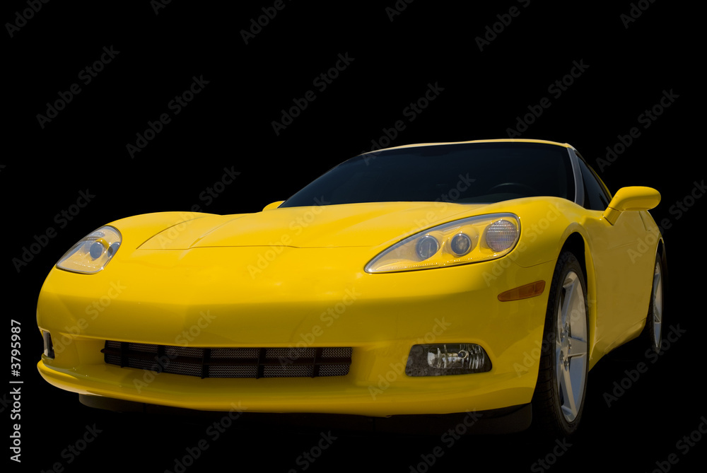A Yellow  sports car isolated on a black.