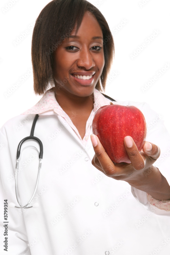 A pretty doctor handing a doctor to the patient A pretty doctor handing a doctor to the patient