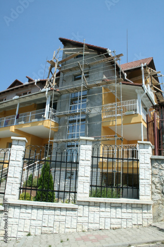 Renovations of a house surrounded by scaffoldings