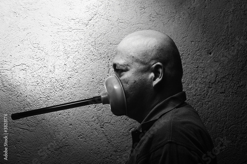 a man silenced with a toilet plunger