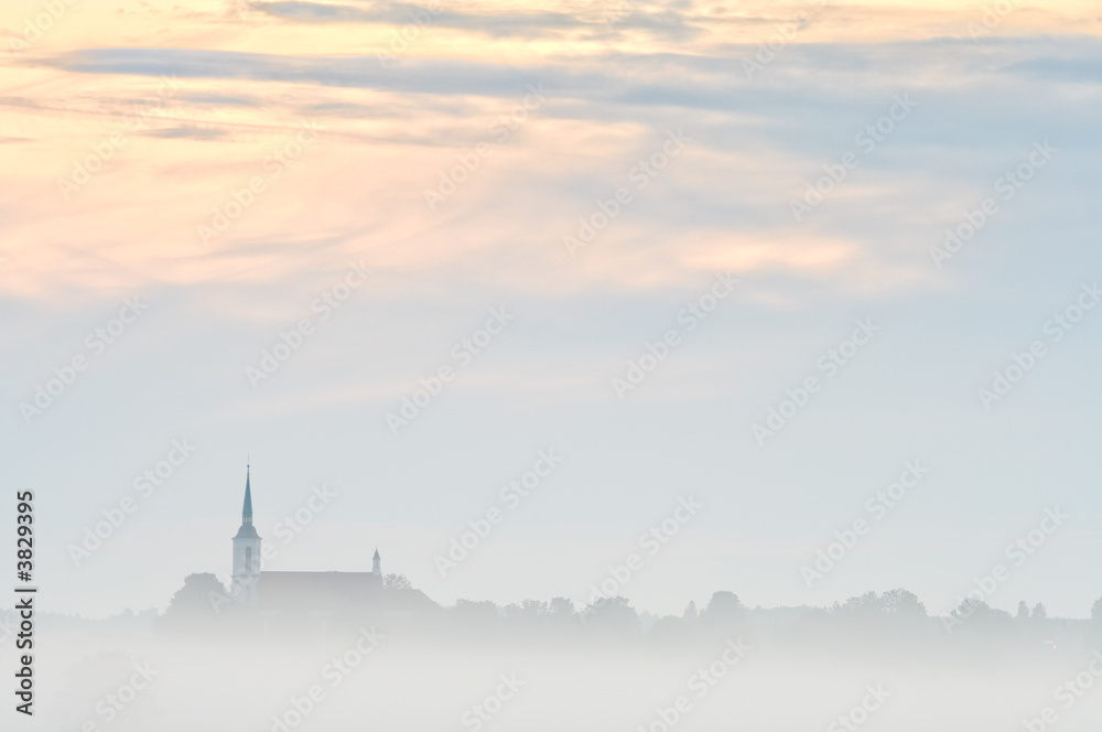 Fog church and trees with colorful sky. Early in the morning. Fog church and trees with colorful sky. Early in the morning.