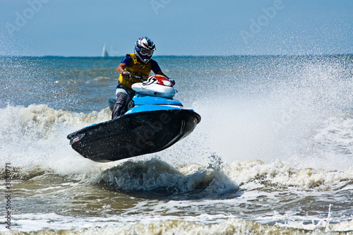 extreme  jet-ski watersports with big waves photo