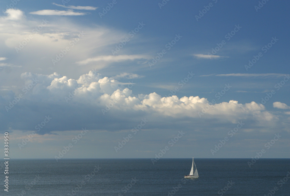 A single yacht at sea.