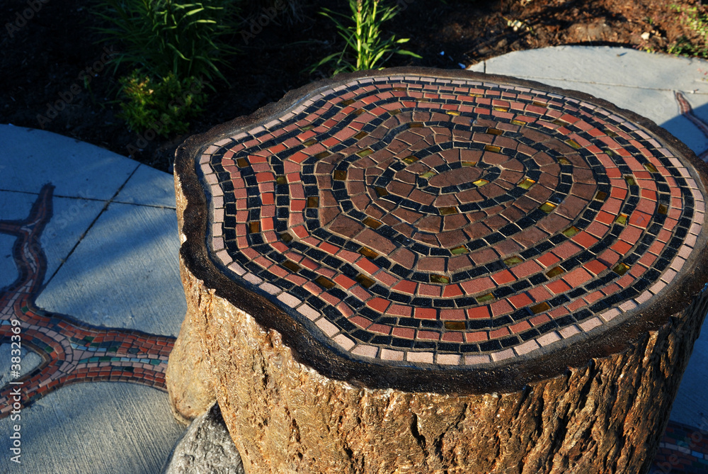 mosaic tree rings on a tree stump seat