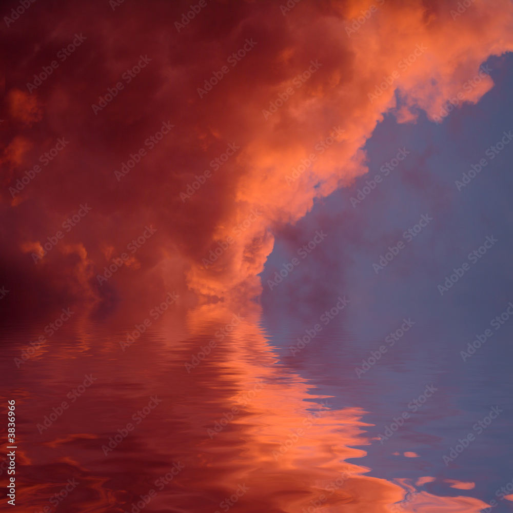 Red clouds with some reflections in the water