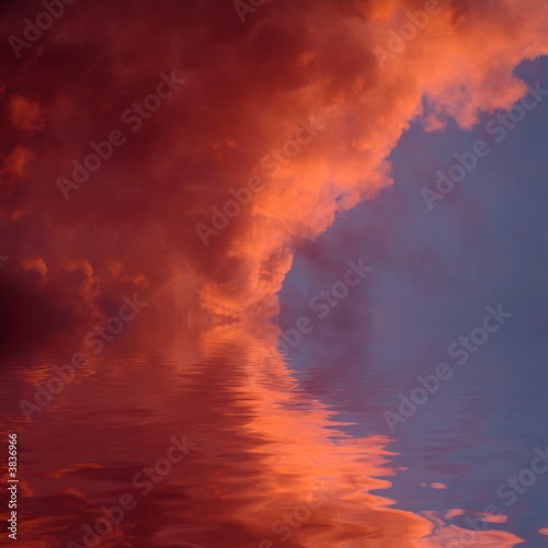 Red clouds with some reflections in the water