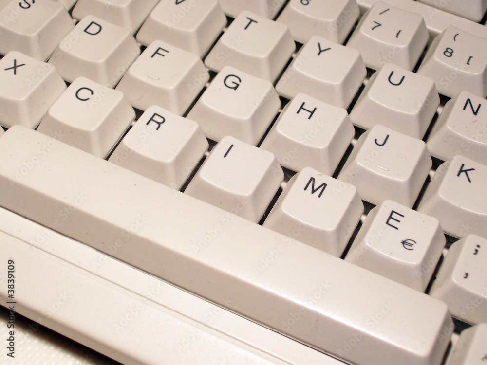 Keys on a computer keyboard spell out the word crime Keys on a computer keyboard spell out the word crime