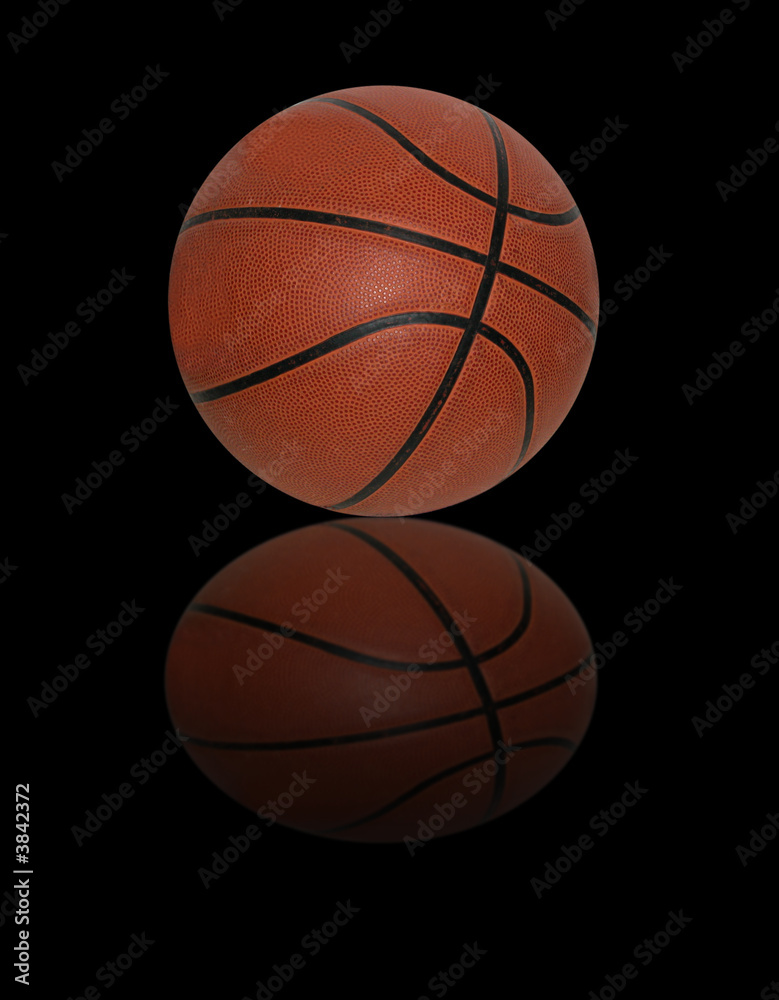 Basketball on black background with reflection