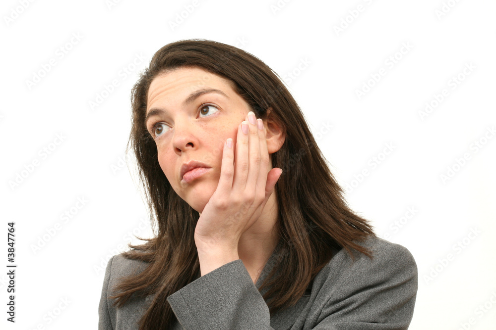 Thinking business woman in a suit isolated over white background Thinking business woman in a suit isolated over white background