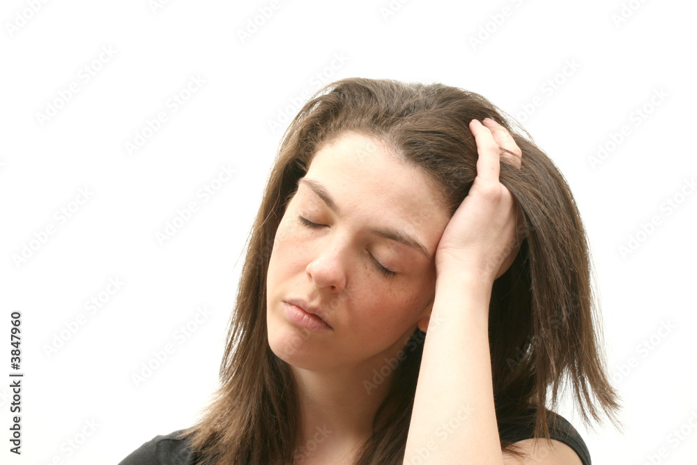 woman with a headache over white background woman with a headache over white background