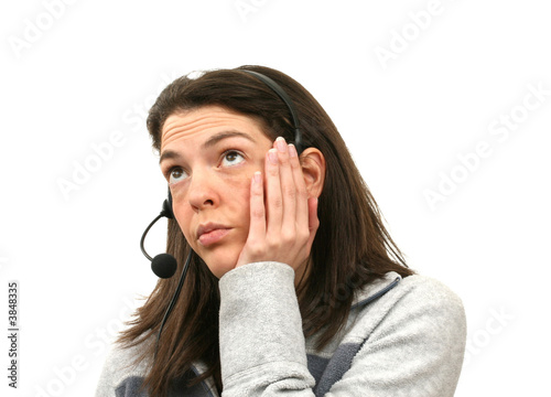 Bored telesales woman isolated over white background
