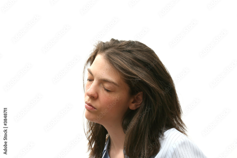 Young woman isolated over white background with eyes closed Young woman isolated over white background with eyes closed
