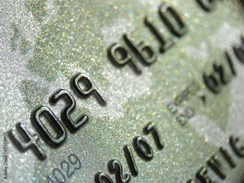 Credit card macro shot. Focus on serial numbers. Very high-tech. photo