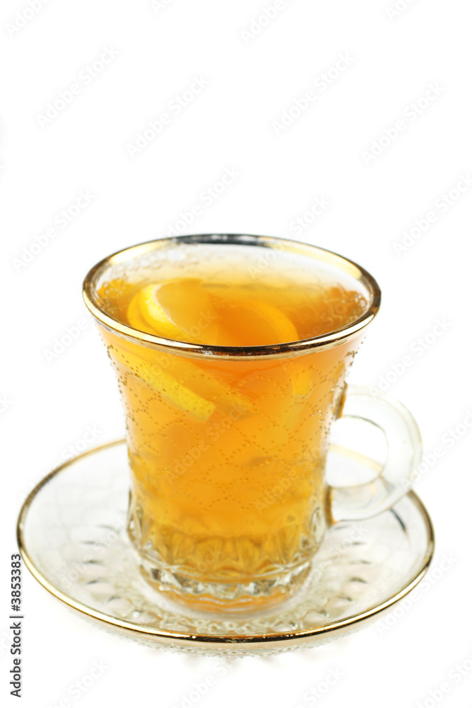 the tea with lemon in glass cup the tea with lemon in glass cup