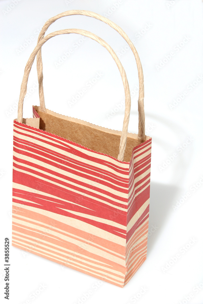 Empty red striped paperbag isolated on white