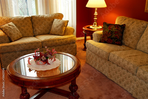 Interior of a cozy living room with sofas and coffee table photo