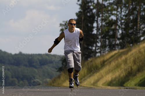 Plakat a young man on rollerblades #5