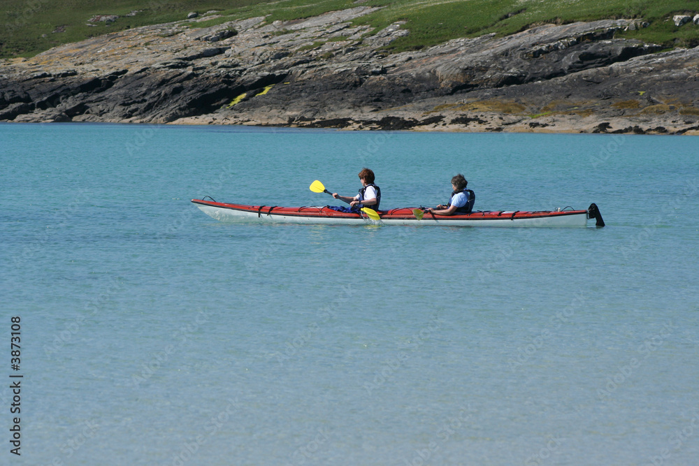 Naklejka premium two women kayaking