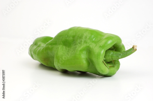 A fresh pepper on a white background.