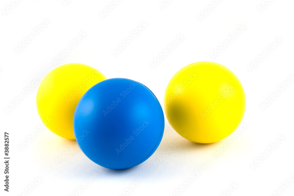 yellow balls and a blue ball