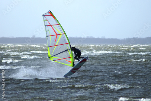 Windsurfer performing an Airjibe