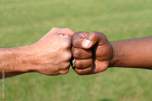 Touching fists © Ugur Anahtarci