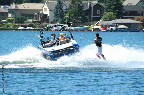 Man waterskiing on the lake.