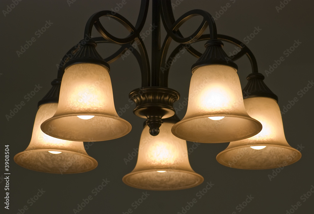 Obraz premium Warm light from chandelier