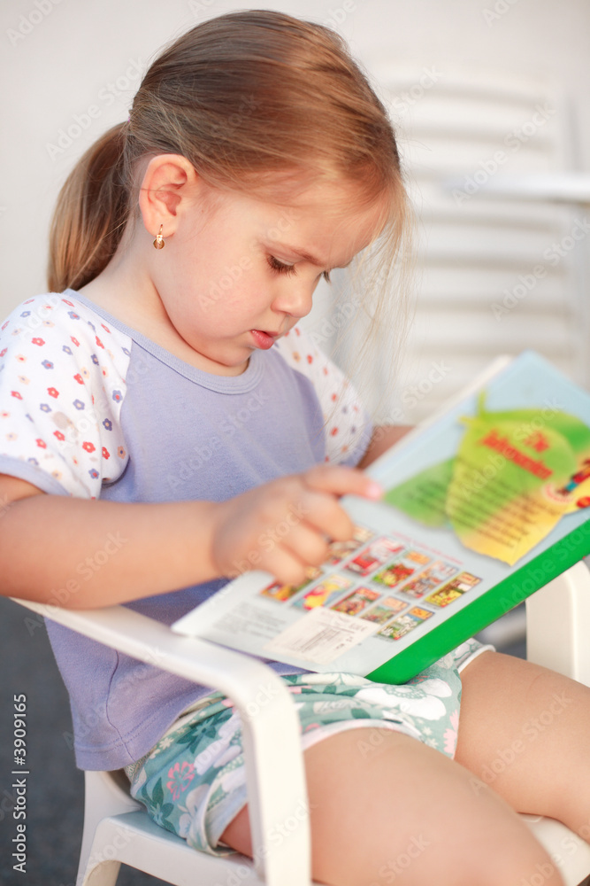 Small girl reading
